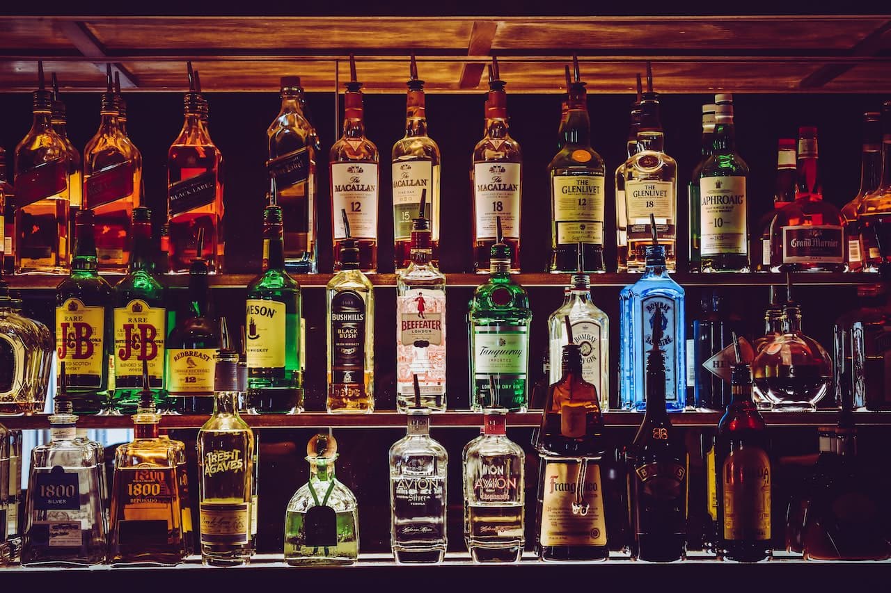 bottles of liquor on bar shelves